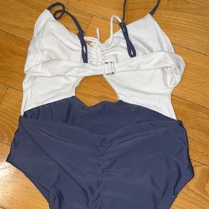 TULA ROSA 2 TONNED ONE PEICE SEXY SWIMSUIT. $130 on revolve right now. Worn once